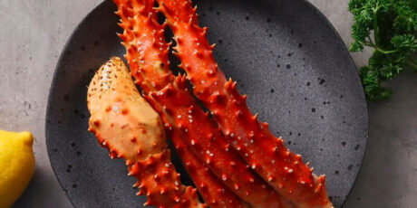 Raw and Cooked Alaskan King Crab Cluster