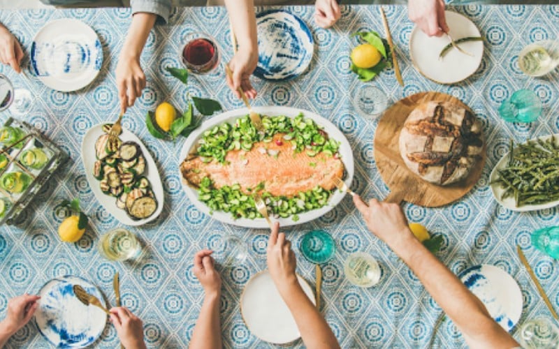 a group of people eating food