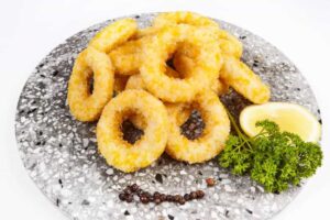 a plate of fried onion rings