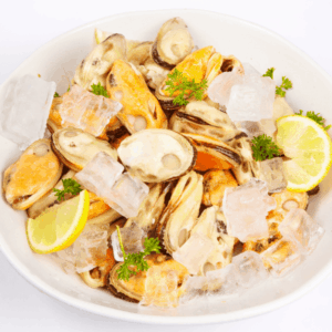 a bowl of food with lemons and ice