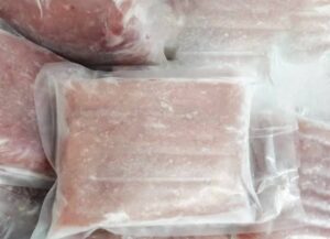 a group of frozen meat in plastic bags