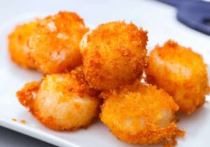 a plate of fried scallops