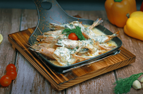 a pan of food on a cutting board