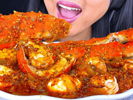 a woman eating a plate of food